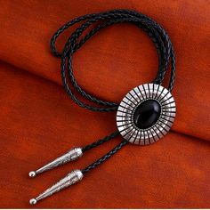 Beautiful Black And Silver Leather Bolo Tie. Many Others Available. Elegant Black Concho Jewelry, Black Western Style Formal Jewelry, Western Black Leather Jewelry, Black Leather Western Jewelry, Western Style Black Leather Jewelry, Cravat Tie, Blue Necktie, Big Butterfly, Ermenegildo Zegna Men