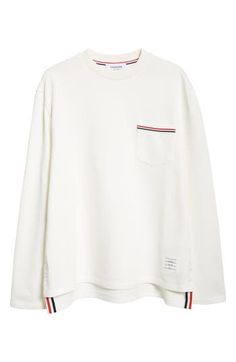 Thom Browne's signature varsity stripes tip the chest pocket of an all-cotton sweatshirt crafted in Italy with a high-low step hem shut with buttons. Crewneck Chest patch pocket Side vents 100% cotton Dry clean Made in Italy Designer Clothing Thom Browne, Chest Pocket, Patch Pocket, High & Low, High Low, Designer Clothing, In Italy, Dry Clean, Nordstrom