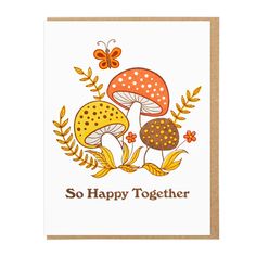 a card with two mushrooms on it and the words so happy together in brown lettering