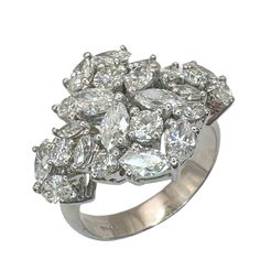 This 18k White Gold Marquise Cut Diamond Ring is a timeless piece in good condition. With 1.99 carats of marquise cut diamonds and 0.74 carats of diamond accents, it is sure to make a statement. Weighing 7.4 grams and marked with "T1365," it is a stunning addition to any collection. Ring size 7.25. 18k Marquise Cut Diamond Ring Condition: In good condition with some minor surface wear consistent with age. Ring size: 7.25 Markings: "T1365" Metal: 18k White Gold Weight: 7.4 grams Marquise Cut Diam Marquise Cut Diamond Ring, Marquise Cut Diamond, Antique Diamond, Marquise Cut, Vintage Designer, Ring Size 7, Diamond Gemstone, Timeless Pieces, Diamond Jewelry