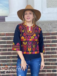 This beautiful Mexican Embroidered Blouse is perfect for any formal event or daily use! These blouses are hand embroidered by Mexican Artisans and completely one of a kind. Note: Model is wearing a M/L Multicolor Embroidered Top With Geometric Patterns For Fall, Multicolor Geometric Embroidered Top For Fall, Traditional Long Sleeve Blouse With Woven Motifs, Folk Style Embroidered Top With Woven Motifs, Festival Embroidered Multicolor Top, Fitted Embroidered Top With Multicolor Design For Fall, Fitted Embroidered Top With Multicolor Embroidery For Fall, Festive Multicolor Embroidered Tops For Fall, Traditional Tops With Intricate Embroidery For Fall