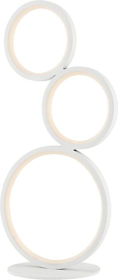 two circular lights on a white surface