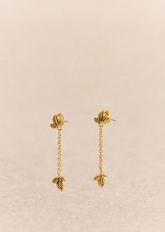 Earrings in 3-micron gold-plated brass, mostly recycled;Non-plated surgical steel stems to avoid allergy risks;Weight: 0.5 g;Length: 3 cm / 1.2 in;Width: 0.6 cm Parisian Style, Gold Earrings, Recycling, Plating, Brass, Gold