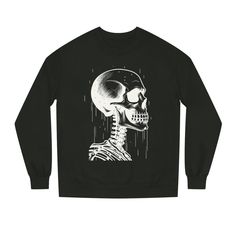 Embrace your inner darkness with our Gothic Sweatshirt featuring a simple yet striking skull design. This sweatshirt is not just a piece of clothing; it's a statement of your unique style and personality. Features: Premium Materials: Crafted with an 80% Cotton - 20% Polyester blend and a yarn thickness of 20 singles, this sweatshirt combines the softness of cotton with the durability of polyester. The 100% Cotton face ensures comfort against your skin. Medium-Heavy Fabric: With a weight of 8.5 oz/yd² (290 g/m this sweatshirt provides warmth and coziness, making it perfect for chilly evenings or those crisp autumn days. Regular Fit: The regular fit offers a comfortable, classic silhouette that complements various body types. It's designed for versatility, allowing you to wear it on its own Halloween Skull Print Sweatshirt For Streetwear, Punk Skull Print Sweatshirt For Streetwear, Winter Skull Print Sweater For Streetwear, Punk Sweatshirt With Skull Print For Streetwear, Black Cotton Sweatshirt With Skull Print, Winter Streetwear Sweater With Skull Print, Halloween Skull Sweatshirt Streetwear, Halloween Skull Sweatshirt For Streetwear, Black Crew Neck Sweatshirt With Skull Print