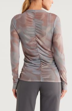 This sheer mesh top is a light layer to your athletic wardrobe with a crewneck and long sleeves for a sport-chic look. 24 1/2" length (size Medium) Crewneck Long sleeves 95% polyester, 5% spandex Machine wash, tumble dry Imported Women's Clothing Versatile Tops For Light Exercise In Spring, Stretch Mesh Top With Crew Neck For Layering, Stretch Crew Neck Mesh Top For Layering, Stretch Long Sleeve Crew Neck Top For Athleisure, Stretch Crew Neck Long Sleeve Top Athleisure, Athleisure Stretch Long Sleeve Crew Neck Top, Fitted Mesh Tops For Fall, Sporty Tops With Mesh Sleeves For Spring, Casual Mesh Tops With Sheer Sleeves