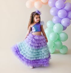 Our skirt, specially made for little princesses, has elasticated waist and lined inside. Their top blouses are lycra and crop cut. Hair accessories are not included. Tulle Mermaid Dress With Ruffles For Pageant, Whimsical Fitted Princess Dress In Mermaid Style, Pageant Mermaid Dress With Ruffles, Tulle Mermaid Dress With Ruffles, Purple Ruffled Mermaid Dress, Fitted Mermaid Princess Dress With Ruffles, Pink Ruffled Mermaid Dress For Pageant, Pink Mermaid Dress With Ruffles For Pageant, Purple Mermaid Princess Dress