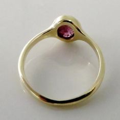 This Tourmaline Ring , Pink Tourmaline Ring , Solid Gold and Gemstone Ring , 14 k Gold Ring , Fine Jewelry , Engagement Ring is just one of the custom, handmade pieces you'll find in our solitaire rings shops. Elegant Tourmaline Birthstone Ring With Bezel Setting, Gold Tourmaline Birthstone Ring For Promise, Gold Tourmaline Birthstone Promise Ring, Elegant Ruby Birthstone Ring With Tourmaline, Gold Tourmaline Wedding Birthstone Ring, Elegant Yellow Gold Tourmaline Birthstone Ring, Yellow Gold Tourmaline Promise Ring, Formal Round Tourmaline Birthstone Ring, Formal Tourmaline Birthstone Ring