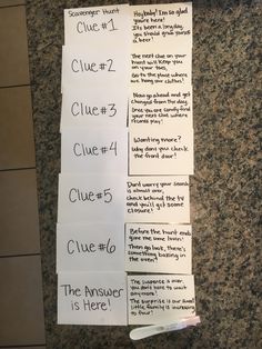 three pieces of paper taped to each other on a counter with the words clue 1, clue 4 and clue 6