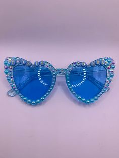 Heart Shaped Glasses Blue Pearls Blue Letters  SOS - Jonas Brothers 5 Albums 1 Night Tour Blue Fun Sunglasses With Tinted Lenses, Fun Blue Tinted Sunglasses, Blue Tinted Fun Sunglasses, Fun Blue Sunglasses For Summer, Fun Blue Sunglasses For The Beach, Fun Blue Sunglasses For Party, Fun Blue Sunglasses For Parties, Blue Sunglasses With Uv Protection For Parties, Blue Glass Sunglasses For Party