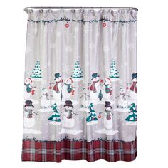 a shower curtain with snowmen and trees on it