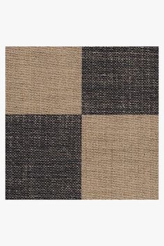 a black and beige checkered rug