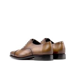 Characterized by its closed lacing style, the oxford is an elegant, classic, timeless style suitable for any occasion. The oxford is a staple shoe in any man’s wardrobe and can be dressed up or down. The Details: Materials: Burnished medium brown Vitellow Italian calf leather Sole: dark red Goodyear Welt mixed leather-rubber sole Last: Savile - Sleek looking aesthetic with slight chisel toe What is Fast Lane? Fast lane is our new experimental 7 day made to order collection, an ambitious never be Luxury Men's Goodyear Welted Dress Shoes, Luxury Goodyear Welted Oxfords For Work, Luxury Elegant Goodyear Welted Oxfords, Luxury Goodyear Welted Lace-up Men's Shoes, Luxury Classic Goodyear Welted Oxfords, Luxury Men's Closed Toe Shoes With Leather Sole, Luxury Men's Closed Toe Shoes For Work, Luxury Men's Closed Toe Oxfords, Brown Goodyear Welted Lace-up Derby Shoes