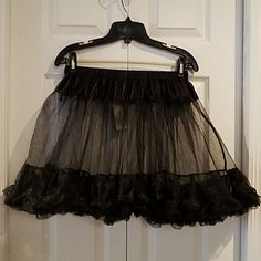 Offered Is A Must Have For Halloween. This Black Mesh Tulle Petticoat Is Perfect For Putting A Little Swish In Your Step. One Size Fits Most. Elastic Satin Waistband. This Is Not Plus Size. New With Tags And In Immaculate Condition. Only One Available So Act Fast. Halloween Costume Petticoat With Attached Cancan, Halloween Costume Petticoat With Cancan, Halloween Ruffled Petticoat For Party, Halloween Party Petticoat With Ruffles, Halloween Party Tulle Petticoat, Fitted Halloween Party Petticoat, Halloween Costume Petticoat With Ruffles, Halloween Party Skirt With Ruffles, Fitted Petticoat For Halloween Costume Party