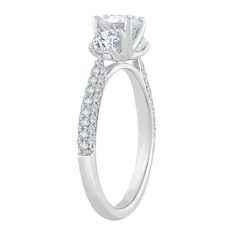 a white gold engagement ring with diamonds on it