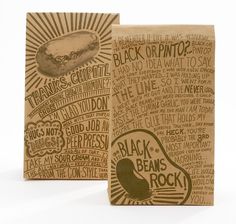 two brown paper bags with black beans rock written on the front and back, each bag has a different type of bean