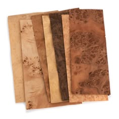 five different colors of wood are shown in this image, including brown and tans