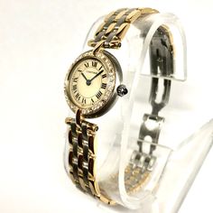 The Cartier Panthere Vendome 18K Gold and Stainless Steel Women's Diamond Watch 23mm 026ct is a timeless classic. This Luxurious Cartier watch is pre-owned, in excellent condition, and comes in an original box with a full warranty from ItsHot.com. Whether you're looking for a classic timepiece or a luxurious statement piece, the  Cartier Panthere Vendome 18K Gold and Stainless Steel Women's Diamond Watch 23mm 026ct is the perfect choice. Each watch can be additionally customized with diamonds (p Classic Yellow Gold Watches With Polished Finish, Cartier Yellow Gold Chronometer Watch Accessories, Cartier Chronometer Watch Accessories In Yellow Gold, Vintage Cartier Yellow Gold Watch, Vintage Yellow Gold Cartier Watch, Timeless Cartier Watch In Yellow Gold, Vintage Cartier Watch For Formal Occasions, Formal Yellow Gold Watch With Polished Finish, Formal Yellow Gold Round Watch