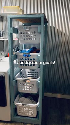 the laundry room is organized and ready to be used as a storage unit for clothes