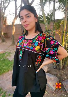 Mexican blouse that Shines you, Fashion as unique as you are. Beautiful blouse made by hand in Chiapas, Mexico creating fashion and art. This is a beautiful blouse with colorful flowers and short sleeve. Very comfortable, Goes great with jeans, leggings, skirt, shorts... Each piece is unique and handmade with dedication and taking care of every detail achieving the best quality in our products, which is why it makes it beautiful and unique each of the embroidered flowers. You can buy the set of Embroidered Short Sleeve Blouse For Festivals, Multicolor Short Sleeve Blouse For Festivals, Multicolor Short Sleeve Festival Blouse, Bohemian Black Short Sleeve Blouse, Multicolor Embroidered Floral Print Short Sleeve Blouse, Black Bohemian Embroidered Short Sleeve Top, Black Embroidered Top For Summer Festival, Folk Style Black Blouse For Summer, Black Folk Style Summer Blouse