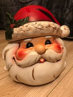 a close up of a santa clause on a table