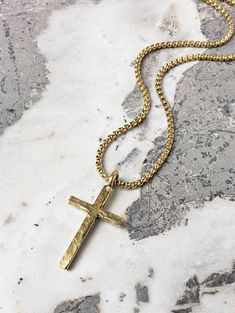 "《《  PENDANT COLLECTION  》》 THE DETAILS The \"RUSTIC GOLD CROSS\" Necklace is designed with an exquisitely detailed Hammered Gold Stainless Steel Cross Pendant, with a cool rustic vibe, hung from a Gold Stainless Steel Box Chain available in your choice of length! 💠🔷️💠View the entire PENDANT COLLECTION here: https://www.etsy.com/shop/MrMacKJewelry?ref=ss_profileFref§ion_id=30638859 MATERIALS * 1 1/4\" × 1/2\" Hammered Gold Stainless Steel Rustic Cross Pendant  * 3mm Gold Stainless Steel Box C Mens Cross Pendant, Gold Cross Pendant Necklace With Box Chain, Gold Cross Necklace With Box Chain, Gold Crucifix Box Chain Jewelry, Gold Crucifix Jewelry With Box Chain, Gold Crucifix Necklace With Box Chain, Gold Crucifix With Box Chain, Gold Adjustable Chain Jewelry For Father's Day, Father's Day Gold Jewelry With Adjustable Chain