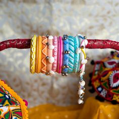 Bohemian Handmade Beaded Bracelets For Celebration, Adjustable Embroidered Multicolor Bracelets, Handmade Multicolor Bangle, Multicolor Embroidered Bangle Jewelry, Multicolor Beaded Bangle For Wedding, Bohemian Multicolor Beaded Bracelets For Weddings, Embroidered Bracelets For Wedding And Festivals, Handmade Bangle For Celebrations, Bohemian Embroidered Bracelets For Weddings