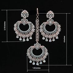 Luxury look American Diamond Chandbali Earrings tikka set from the house of IndianDesigns(Z). Rose Gold plated Earrings and maang tikka set studded with studding high quality American diamond and CZ color stones. Diamond Chandbali Earrings, Diamond Chandbali, Maang Tikka Set, Mang Tikka, Indian Jewelry Earrings, Chandbali Earrings, Maang Tikka, Color Stones, Kundan Necklaces