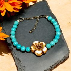 Charming Turquoise Beaded Bracelet accented with Saguaro blossom.  All of our jewelry is lead and nickel free.  Handmade Jewelry that Embodies the Rugged Spirit of the Wild West.  All listings in my shop are my original handmade designs therefore not any two pieces are exactly alike. I carefully craft each in my studio here in Tennessee.  Thank you for visiting and have a wonderful day! Turquoise Beaded Flower Bracelets, Turquoise Beaded Flower Bracelet, Bohemian Flower Bracelets Nickel Free, Nickel-free Bohemian Flower Bracelets, Adjustable Turquoise Flower Beaded Bracelet, Saguaro Blossom, Beaded Bracelet Flower, Simple Bead Earrings, Flower Charm Bracelet