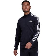 Look iconic lap after lap in this men's track jacket from adidas. Look iconic lap after lap in this men's track jacket from adidas. Moisture-wicking Lightweight warmth Zip front 2-pocket Long sleevesFIT & SIZING Relaxed fitFABRIC & CARE 100% recycled polyester Machine wash Imported Color: Dark Blue. Gender: male. Age Group: adult. Moisture-wicking Athleisure Outerwear For Jogging, Adidas Sporty Tracksuit For Sports, Moisture-wicking Long Sleeve Track Jacket For Jogging, Adidas Athleisure Track Jacket With Side Stripes, Adidas Moisture-wicking Track Jacket For Training, Functional Long Sleeve Track Jacket For Jogging, Moisture-wicking Track Jacket For Jogging, Sports Tracksuit With Three Stripes And Long Sleeves, Sports Track Jacket With Side Stripes