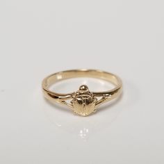 "Thanks for shopping our vintage estate store. We tend to sell well below wholesale and truly hope you enjoy all of our items. Many of the items are one of a kind, so please enjoy scrolling through the pictures and hopefully something will catch your eye. Brown spots are from camera or reflections. Estate 14k yellow gold beetle bug infant or baby ring. Custom made ring for our shop. Ring size: 1 Setting: 5mm 1/4\" Band width: 1.5mm Weight: .66 gram Marked 14k and it's sweet. One that you will lo Vintage Gold Signet Ring With Birthstone, Vintage Gold Birthstone Ring Collectible, Classic 14k Gold Birthstone Ring Collectible, Vintage 14k Gold Birthstone Ring Gift, Vintage Gold Birthstone Ring As Gift, Vintage Gold Birthstone Ring For Gift, Gold Vintage Birthstone Ring As Gift, Gold Vintage Birthstone Ring For Gift, Classic Gold Birthstone Ring As Collectible