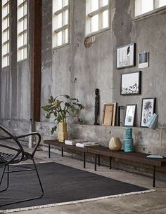 a living room filled with lots of furniture and pictures on the wall next to each other