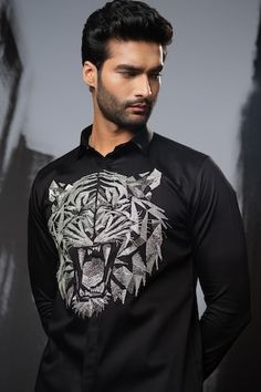 Black shirt with cutdana placement embroidery in 3D tiger face pattern. - Aza Fashions Designer Embroidered Black Shirt, Designer Black Embroidered Shirt, Festive Black Cotton Shirt, Festive Black Embroidered Shirt, Festive Party Shirt With Embroidery, Festive Embroidered Party Shirt, Designer Black Tops For Festive Season, Designer Black Tops For Festive Occasions, Men Shirts Casual