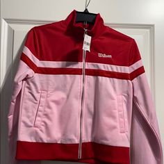 Zipper Jacket Pink Red Wilson Never Worn Trendy Red Long Sleeve Track Jacket, Trendy Red Track Jacket For Fall, Trendy Pink Fall Track Jacket, Red Long Sleeve Track Jacket For Spring, Red Long Sleeve Spring Track Jacket, Red Sporty Outerwear With Zipper Closure, Sporty Red Outerwear With Zipper, Sporty Red Outerwear With Zipper Closure, Windbreaker Jacket Women