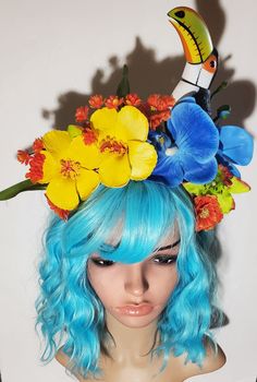 Toucan, Toucan headpiece, Tiki oasis, TIki, Tiki bar, Burlesque, Tropical headpiece, Tropical flowers, Bird, Bird crown, Toucan headband Who doesn't want a bird on their head? I do I do I do This is a series of Toucan's 2020 Comfy headband I love it Beautiful flowers surround the bird I mean how do you not love it? I am obsessed with birds! Whimsical Headband For Carnival, Toucan Costume, Tropical Headpiece, Tiki Oasis, Tiki Tiki, Island Vibes, Costume Hats, Tiki Bar, Tropical Flowers