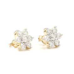 Add a delightful cluster to your outfit with the sparkle of these lab grown diamond stud earrings. Crafted in 14K gold, each earring is formed into a flower shape with I-J, VS-SI lab grown brilliant round diamonds. Radiant with 2.00 carat total weight of lab diamonds and a bright polished shine, these post earrings secure comfortably with friction backs. The Sku number is 455160 Product Details DiamondCarat total weight: 2 CaratsCount: 14Shape: RoundColor: I-JClarity: VS-SIJewelry Metal: 14kt Go White Brilliant Cut Cluster Earrings, White Cluster Earrings With Brilliant Cut, Classic Cubic Zirconia Cluster Earrings, Brilliant Cut Diamond White Cluster Earrings, Diamond White Cluster Earrings With Brilliant Cut, Anniversary Cluster Earrings With Prong Setting, Classic Cluster Earrings With Diamond Accents In Flower Shape, Classic Diamond Flower Cluster Earrings, Classic Diamond Cluster Earrings With Flower Shape