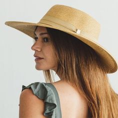 Wide brim straw sun hat with a grosgrain ribbon band with small gold bar accent. UPF 50+ Adjustable inner drawstring Circumference 57cm (M) Brim: 4 in.   FUR FELT HATS OR WOOL HAT  ] ●  to dust off, use a soft brush. Gently brush, working your way around in a counter-clockwise direction. ●  Steam it to shape if necessary  [ STRAW HATS ] ●  Spot cleans the brim only using a soft cloth and cold water then allows it to naturally dry. ●  Steam your hat to reshape, if necessary.  [ SUEDE LEATHER HATS Lightweight Hats With Curved Brim For Sunbathing, Lightweight Curved Brim Hat For Sunbathing, Adjustable Short Brim Hat For Sunbathing, Adjustable Curved Brim Hat For Sunbathing, Wide Brim Boater Hat With Upf 50+ For Travel, Upf 50+ Curved Brim Boater Hat For Kentucky Derby, Kentucky Derby Wide Brim Sun Hat With Uv Protection, Kentucky Derby Lightweight Wide Brim Hat, Brimmed Hat With Upf 50+ For Sunbathing