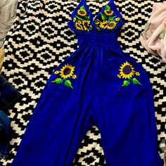 Mexican Romper Embroidered By Hand Handcrafted W Vintage Indigenous Techniques Handmade Stitched Using The Best Materials High Quality Fabric And Threads For Crochet Details Ans Colorful Embroidery. Authentic Traditional Vintage Mexico Style. Navy Blue Color Sunflowers Size: L Embroidered Cotton Jumpsuits And Rompers For Spring, Yellow Fitted Cotton Jumpsuits And Rompers, Spring Embroidered Fitted Jumpsuits And Rompers, Embroidered Fitted Jumpsuits And Rompers For Spring, Yellow Floral Embroidery Bottoms For Spring, Spring Yellow Bottoms With Floral Embroidery, Yellow Floral Embroidered Bottoms For Summer, Yellow Bottoms With Floral Embroidery For Summer, Yellow Floral Embroidery Bottoms For Summer