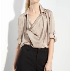 A Drapey Cowl Neck Extends From The Classic Collar On A High-Sheen Satin Blouse Finished With Button-Tab Sleeves. Defect: Has Pulled Thread, Barely Noticeable. Has A Water Stain That Can Be Dry Cleaned. Longer Back Hem. Polyester; Dry Clean. Versatile Collared Blouse For Formal Occasions, Versatile Collared Formal Tops, Naomi Clark, Cowl Neck Blouse, Draped Blouse, Cowl Neck Long Sleeve, Va Va Voom, Cowl Neck Top, Office Attire