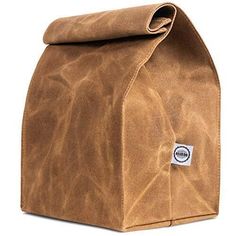 a brown bag sitting on top of a white surface