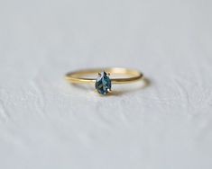 "London Topaz Ring, Topaz Ring in 14K Gold Vermeil, London Topaz Engagement Ring, Pear Shape Ring, 4 Prong Set Ring, November Birthstone Ring \"Delicate gold London blue topaz ring, dainty engagement ring with oval-shaped blue gemstone. Minimal stacking ring, simple and yet elegant. Anniversary gift for wife, Bridesmaid gift, Valentine's Day gift, Mother's Day gift, wedding gift. Perfectly matching with gold stacking rings. December birthstone ring. Blue Topaz is known to soothe, recharge, heal, Pear Shape Ring, London Topaz Ring, London Topaz, Engagement Ring Pear, Dainty Engagement, November Birthstone Ring, December Birthstone Ring, Dainty Engagement Rings, Pear Shaped Ring