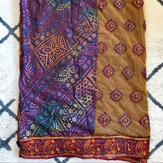 Multicolored Gold And Purple Saree With Red Paisley Trim And Sheer Overlay. Has Red And Blue/Purple Flowers Embroidered On Gold Sheer Part. Never Worn. Comes With Extra Fabric. Formal Saree, Flowers Embroidered, Purple Saree, Blue And Purple Flowers, Gold And Purple, Red Paisley, Sheer Overlay, Extra Fabric, Purple Gold