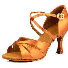 a pair of women's dance shoes with straps on the front and heel, in orange