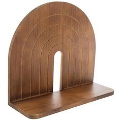 a wooden shelf with a arch shaped like a circle