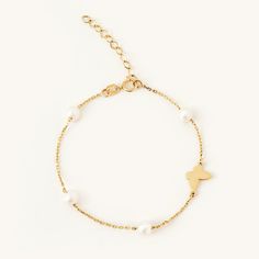 1- D E S C R I P T I O N This 14K Solid Gold Butterfly Bracelet is a charming piece of jewelry that will amplify your everyday style. Made with an elegant butterfly chain design, it features a dainty pearl accent for a subtle hint of sophistication. It's a real 14k gold accessory and a thoughtful gift for her. This dainty bracelet is a standout piece that's versatile for any occasion. 2- P R O D U C T ∙  F E A T U R E S * Gold Material: 14K solid gold * Gold Color Options: Yellow gold, Rose gold, White gold * Stone: Pearl * Chain Length Options: 5", 5.5", 6", 6.5", 7" +1" Extender * Dimensions:  Height: 5 mm / 0.20 in Width: 10 mm / 0.39 in 3- D E L I V E R Y ∙ D E T A I L S We understand that you are looking forward to receiving your order and we are just as excited to get it to you. We t Luxury 14k Gold Pearl Bracelet, Luxury Yellow Gold Rosary Bracelet Gift, Yellow Gold Plated Pearl Bracelet Gift, Gold Plated Yellow Gold Pearl Bracelet Gift, Gold-plated Yellow Gold Pearl Bracelet Gift, Timeless Yellow Gold Charm Bracelet As Gift, 14k Yellow Gold Pearl Bracelet, Gold Pearl Bracelet In 14k, Gold Pearl Bracelet In 14k Fine Jewelry