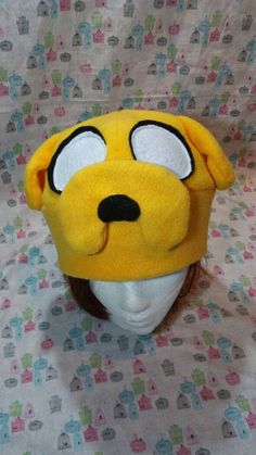 Adventure Time Jake the Dog Inspired Fleece Hat Handmade Playful Halloween Costume Hat, Themed Cosplay Hat, One Size Fits Most, Themed Hats For Cosplay, One Size Fits Most, Novelty Hat For Cosplay Costume Accessories, Fun Adjustable Costume Cap, Novelty Costume Hat For Cosplay, Themed Cosplay Hat, Novelty Cosplay Costume Hat, Themed Winter Hats For Cosplay