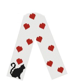 a white ribbon with red hearts and a black cat on it