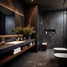 a large bathroom with marble walls and flooring