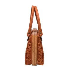 Introducing our Cognac Leather Purse, a stylish tote bag with a top handle designed for everyday use. Dimensions: 10.8 x 7.6 x 4.5 inches (27.5 x 19.5 x 11.5 cm) Material: Crafted from a combination of genuine leather and real oak wood. Please Note: The actual color of the item may vary slightly from the pictures shown on the website due to differences in monitor brightness settings on your computer. Brown Top Handle Box Bag With Handle Drop, Brown Box Bag With Handle Drop Top Handle, Brown Box Bag With Handle Drop And Top Handle, Leather Box Bag With Double Handles, Brown Satchel Box Bag With Handles, Brown Tote Box Bag With Detachable Handle, Rectangular Leather Box Bag With Leather Handles, Cognac Leather Handheld Bag, Handheld Leather Bag In Cognac Color