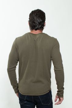 KNITTED HENLEY T-SHIRT IN MILITARY GREEN Green Stretch T-shirt For Fall, Khaki Stretch Crew Neck Top, Olive Cotton Crew Neck Tops, Olive Crew Neck Top For Fall, Green Crew Neck Basic Tops, Fall Olive Crew Neck Top, Basic Green Crew Neck Top, Green Basic Crew Neck Tops, Green Sporty T-shirt For Everyday Wear