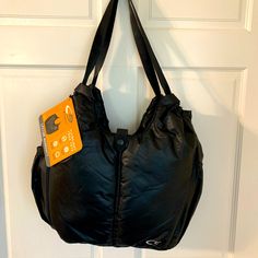 This Is A Really Nice Large Black Yoga Bag. It’s Very Lightweight With Lots Of Pockets. There Are Two Large External Side Pockets (Perfect For Water Bottles, Soppy Cups Or Baby Bottles.). The Interior Is A Bright Purple And Has Lots Of Deep Pockets. This Bag Would Be Perfect For A Variety Of Uses Including Yoga, Dance, Gym, And Baby Bag! Measurements Are 18.5 Inches Wide By 12 Inches High (In The Middle) By 5 Inches Deep With A Drop Of 15 Inches. Check Out My Other Listings For More Beautiful Bags And Accessories! Packable Outdoor Bags, Lightweight Functional Nylon Bags, Functional Lightweight Nylon Bags, Functional Gym Bag For Outdoor Activities, Functional Gym Bag For Outdoor, Lightweight Nylon Shoulder Bag For Everyday Use, Black Shoulder Bag For Outdoor Gym, Black Shoulder Bag Gym Bag For Outdoor, Black Gym Shoulder Bag With Zipper Pocket